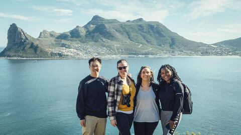 GIEP students in front of a mountain