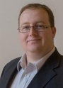 A professional photo of Chris Brooks