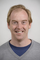 A professional photo of Grant Schoenebeck