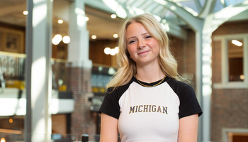 A headshot of Claire Weadock in the Michigan Union