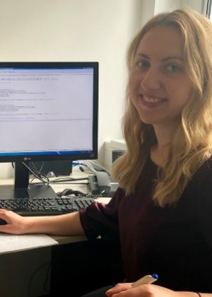 Inna Smirnova sitting at a computer