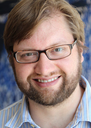 A headshot of Nate Oostendorp