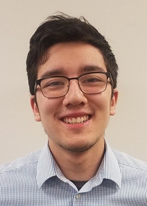 A headshot of Trevor Harkness