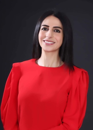 A headshot of Ghadir Awad