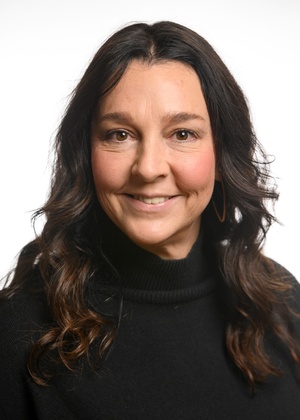 A headshot of Sara Vanderelzen