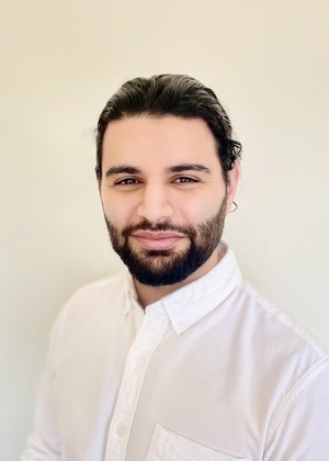 A headshot of Kenan Alkiek
