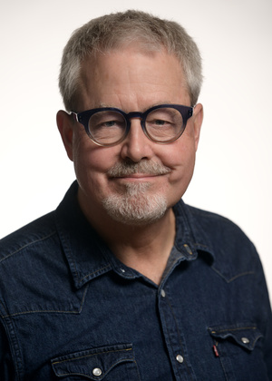 A headshot of James Reitz