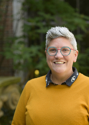 A headshot of Libby Hemphill taken outside.