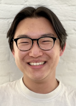 A headshot of Kevin Zheng