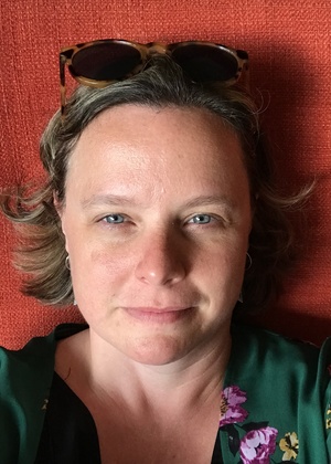A headshot of Becky O'Brien