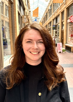 Shannon Gass standing in the Arcade in Ann Arbor, MI.