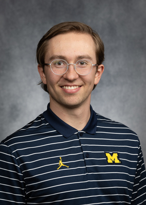 A headshot of Mark Holmgren