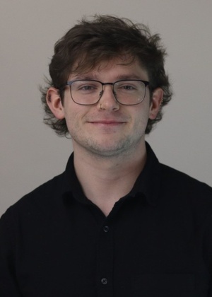 A headshot of Duey Smith