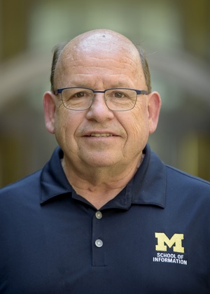 A headshot of Paul Conway