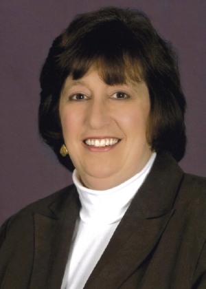 A headshot of Martha E. Pollack