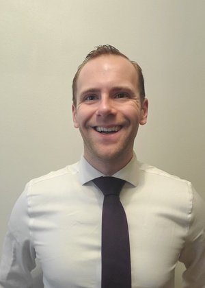 A headshot of Matthew Jones