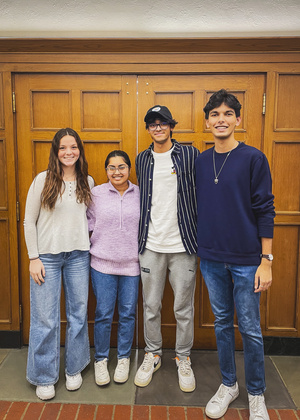 Aubrey Hickmott, Arunika Shee, Ansh Mehta and Shobhit Samar pose for a team photo. 
