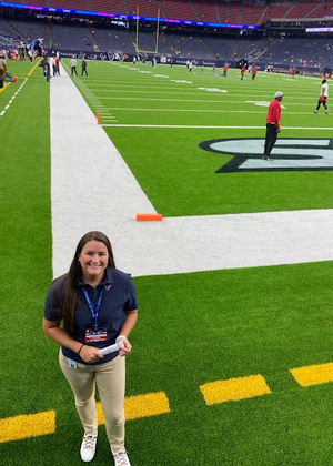 Samantha Thick on a football field