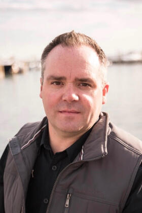 A headshot of Bill Thompson