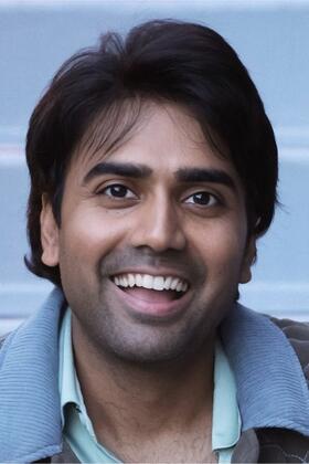 A headshot of RJ Jain