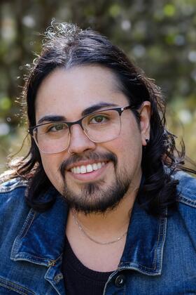 A headshot of Damon Carucci