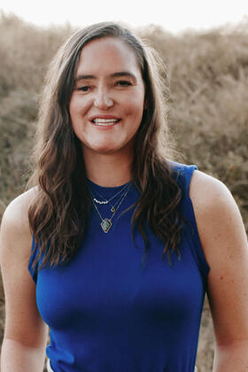 A headshot of Laura Raines