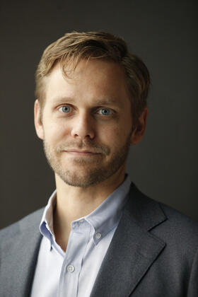 A headshot of Matt Raw