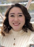 A headshot of Julia Dang