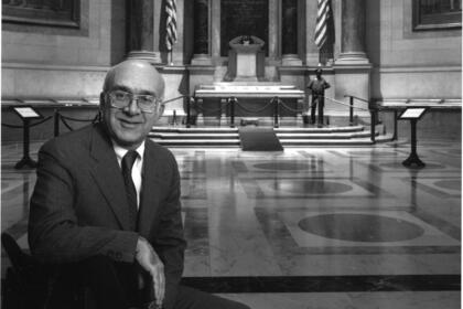 Robert Warner posing in a building in Washington DC.