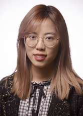 A headshot of April Wang