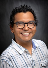 A headshot of Allan Martell