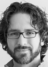 A headshot of Derek Cooper 