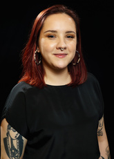 A headshot of Abril Vela