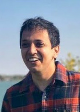 Headshot of Vaishnav smiling
