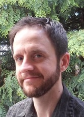 A headshot of Christopher Quarles